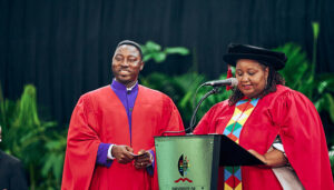 PhD graduate, Dr Isaac Nketsia (left), with College Dean of Research, Professor Phocenah Nyatanga.